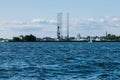 View from the water on the coastline of Kronstadt,cargo ships,Floating drilling rig,drilling cranes.Russia,Kronstadt,31