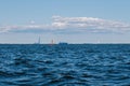 A view from the water of the Gulf of Finland on a summer day,cargo ships and ships are sailing in the distance,blue Royalty Free Stock Photo