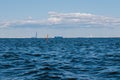 A view from the water of the Gulf of Finland on a summer day,cargo ships and ships are sailing in the distance,blue Royalty Free Stock Photo