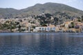 Main Harbor of Symi Island Greece with Colorful Houses on the Mountain Side Royalty Free Stock Photo