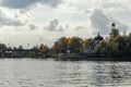 View from the water to the Church of the Holy Blessed Grand Duke Alexander Nevsky in Ust-Izhora in autumn. Boat trip. Russia, St.