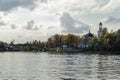 View from the water to the Church of the Holy Blessed Grand Duke Alexander Nevsky in Ust-Izhora in autumn. Boat trip. Russia, St.