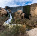 View of the waterfall and overflow of the dam wall of the Elche Reservoir Royalty Free Stock Photo