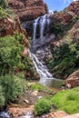 View of a waterfall and river in a mountainous area in Walter Sisulu National botanical gardens Royalty Free Stock Photo