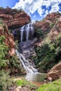 View of a waterfall and river in a mountainous area in Walter Sisulu National botanical gardens Royalty Free Stock Photo