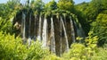View of waterfall and rock, beautiful nature landscape, Plitvice Lakes in Croatia, National Park, sunny day with blue sky Royalty Free Stock Photo