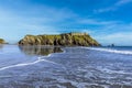 A view from the waters edge on the South Beach looking towards Saint Catherine`s Island in Tenby, Pembrokeshire Royalty Free Stock Photo