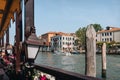 View from a waterside restaurant of a water taxi riding through Grand Canal in Venice, Italy Royalty Free Stock Photo