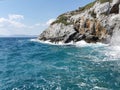 View of the waves of the Aegean Sea and fantastic cliffs. Turkey, Kusadasi.