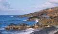 View of waves breaking into the rocks in south coast of Maui Royalty Free Stock Photo