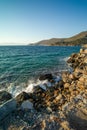 View of waves hitting the rocky shore of Knidos Datca in Turkey