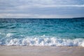 View of the waves from the sandy beach to the sea. Royalty Free Stock Photo