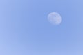 View on waxing gibbous Moon in a blue sky