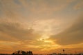 View of the weather in the evening, looking at the sun and the orange-yellow sky