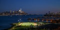 New York City. View of the soccer field and Manhattan skyline from Weehawken, NJ, at dusk. Royalty Free Stock Photo