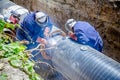 View on welding team of welders until them assembly a new pipeline Royalty Free Stock Photo