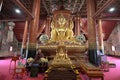 View of west-facing Golden Buddha image at Wat Phumin, a Buddhist temple in Nan, Thailand