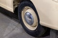 View of the wheel with disk of the old Russian car of the executive class released in the Soviet Union beige GAZ m-20 pobeda Royalty Free Stock Photo