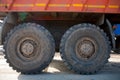 View of wheels of heavy truck in autumn forest area