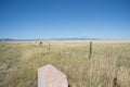 A view of the Overland trail with a historical Marker with the Snowy Range Mountain in the background Royalty Free Stock Photo