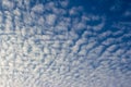 View of white Altocumulus cloud against a blue sky Royalty Free Stock Photo