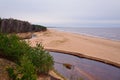 View from white dune where river flows to the sea