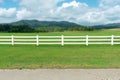 View of White fence on grass garden Royalty Free Stock Photo