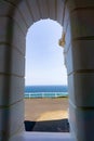 View through whitewashed structural arch on Cape Byron Lighthouse Royalty Free Stock Photo