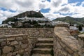 View of the whitwashed Andalusian village of Zahara de la Sierra and its Moorish Castle on the hilltop