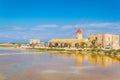 View of a windmill in the Saline di Trapani e Paceco natural reserve near Trapani, Sicily, Italy Royalty Free Stock Photo