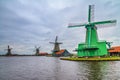 View of the windmills on a cloudy winter day at the Zaanse Schan in the neighbourhood of Zaandam town, near Amsterdam, Netherlands Royalty Free Stock Photo