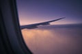 View from window of airplane during flight above clouds Royalty Free Stock Photo