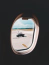 View through the window of the airport and transport from inside the passenger plane