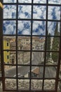 View from the window of the ancient castle of the fortress. View of an old European city against a blue sky Royalty Free Stock Photo