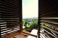 View from window with blinds of house in Nocera Umbra, town and comune in the province of Perugia, Italy