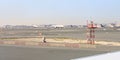 View from the window of a Flydubai aircraft moving along the runway to the standing planes of world airlines and the airport Royalty Free Stock Photo