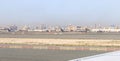 View from the window of a Flydubai aircraft moving along the runway to the standing planes of world airlines and the airport Royalty Free Stock Photo