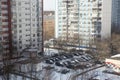 View from the window of a high-rise building into the courtyard and panel houses in winter in spring Royalty Free Stock Photo