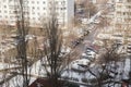 View from the window of a high-rise building into the courtyard and panel houses in winter in spring Royalty Free Stock Photo