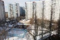View from the window of a high-rise building into the courtyard and panel houses in winter in spring Royalty Free Stock Photo