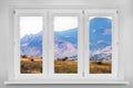 View from the window. Mountain forest landscape under evening sk