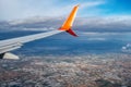 View from the window of the orange and white wing of an airplane flying over Antalya Turkey. Air travel concept. Beautiful Royalty Free Stock Photo