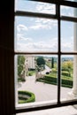 View from the window of the road and trimmed bushes in the garden near the house Royalty Free Stock Photo