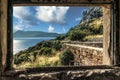 View from a window of the ruins of the lighthouse of Capo Zafferano in Sicily (Italy) Royalty Free Stock Photo