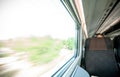 View of a Window scrolling the Landscape inside High Speed Train Royalty Free Stock Photo