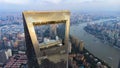 View Through Window Of Shanghai Skyscraper To Low Rise Residential District in Pudong.