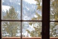View from the window on the snow-covered forest. Carpathians. Ukraine. window to Europe Royalty Free Stock Photo