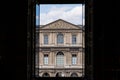 View from a window to the Louvre Museum historic building in Paris Royalty Free Stock Photo