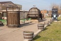 A view of a wine barrel and a wine press in firm shop