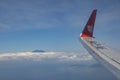 View of the wing of a Lion Air plane, Indonesia Royalty Free Stock Photo